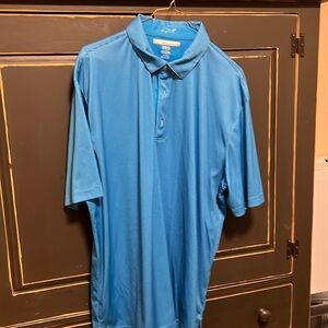 ML 75 Greg Norman blue collared shirt